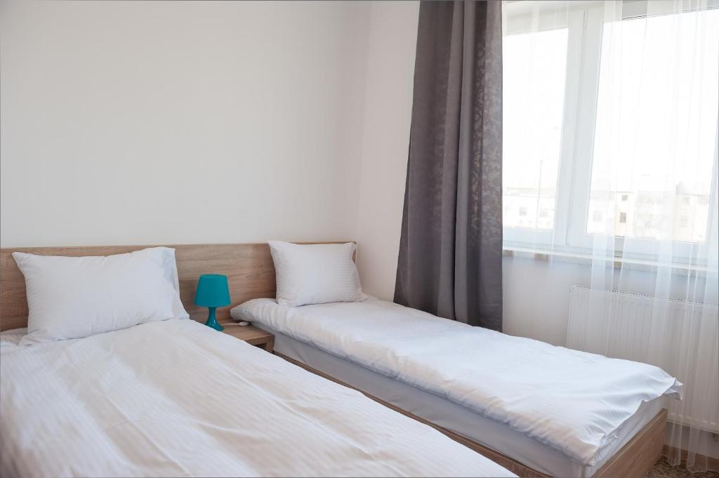 Postel nebo postele na pokoji v ubytování Patra