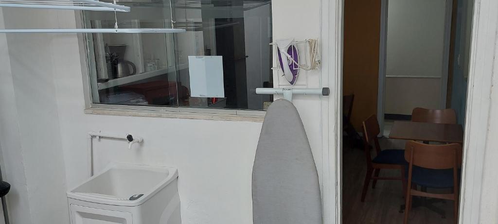 a bathroom with a sink and a mirror at Hostel Leblon in Rio de Janeiro