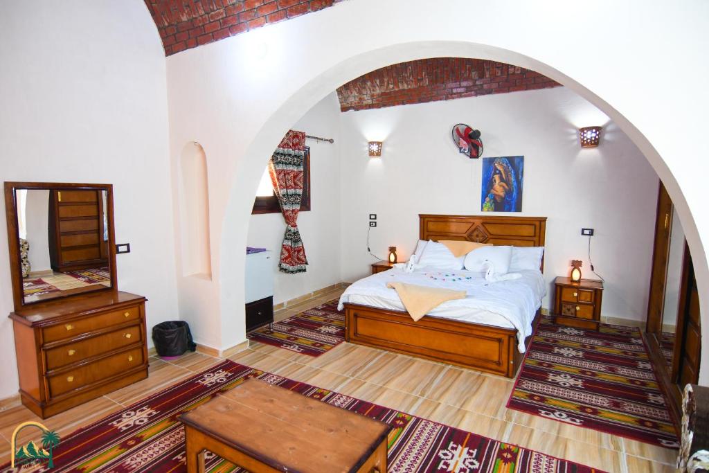 Postel nebo postele na pokoji v ubytování amzran hotel siwa