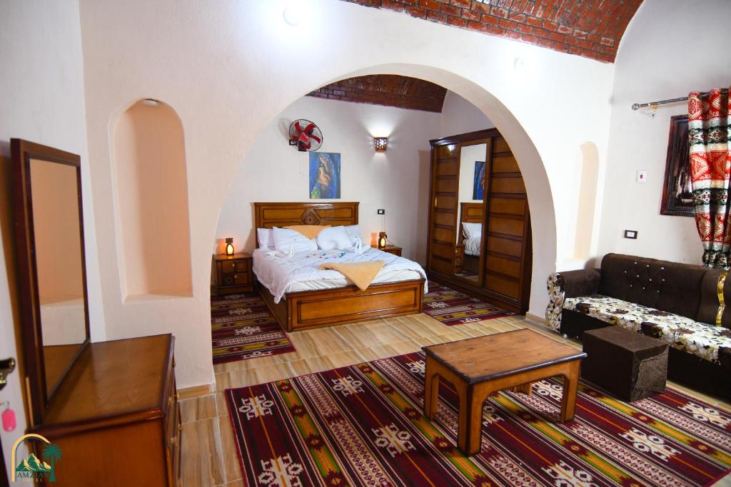 Postel nebo postele na pokoji v ubytování amzran hotel siwa