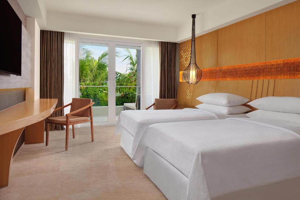 Letto o letti in una camera di Four Points by Sheraton Bali, Ungasan