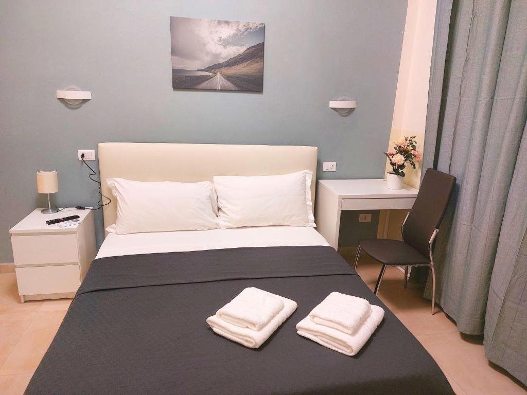 Postel nebo postele na pokoji v ubytování Bonaini Relax B&B