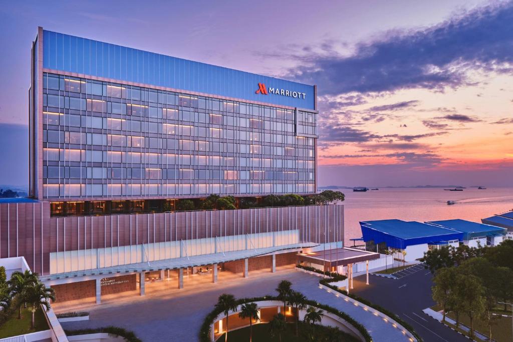 an aerial view of a virgin hotel at sunset at Batam Marriott Hotel Harbour Bay in Nagoya