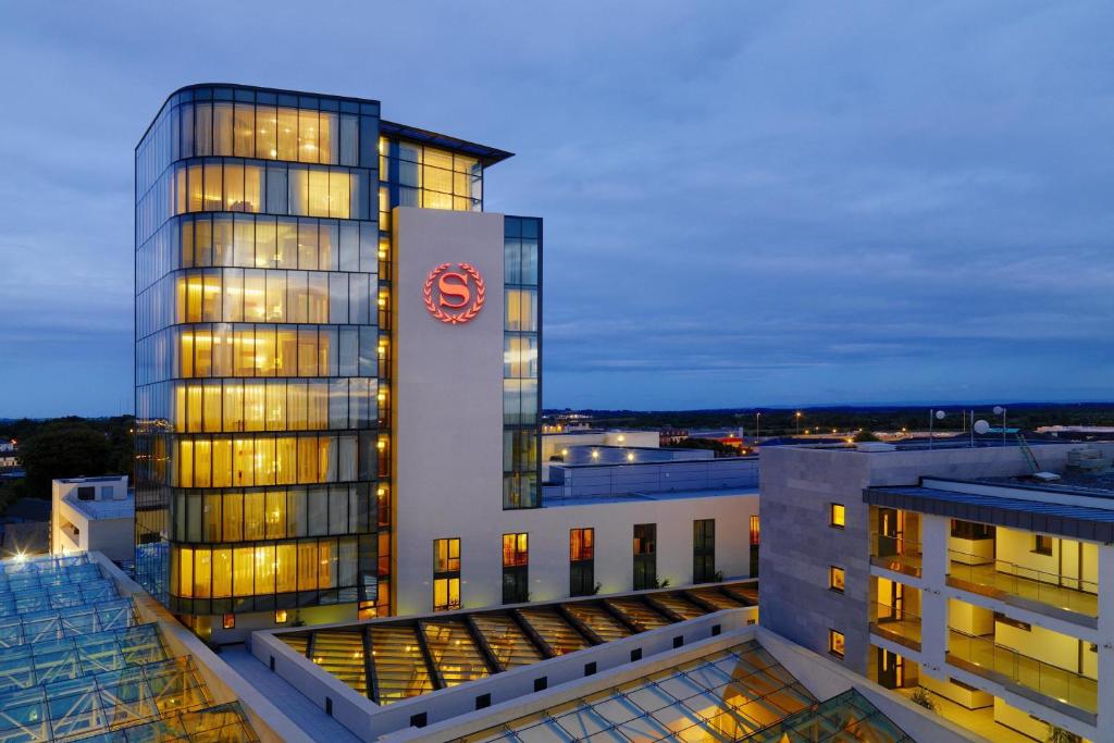 a building with a clock on the side of it at Sheraton Athlone Hotel in Athlone