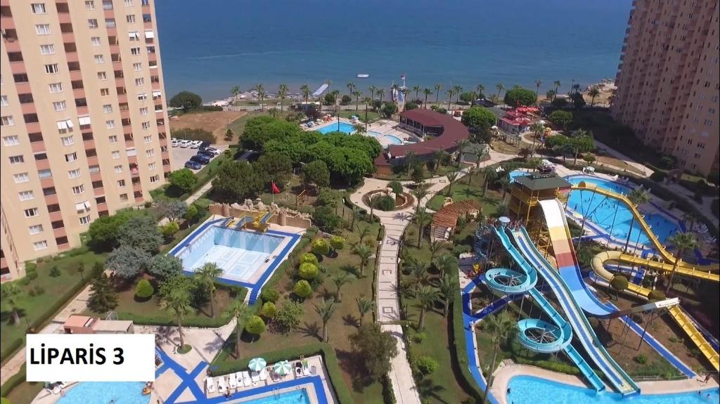 an aerial view of a water park in a city at Liparis3 holiday, beach,aquapark, in Erdemli