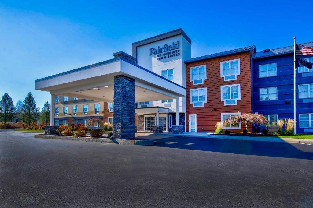 a rendering of a hotel with a parking lot at Fairfield Inn & Suites by Marriott Cortland in Cortland
