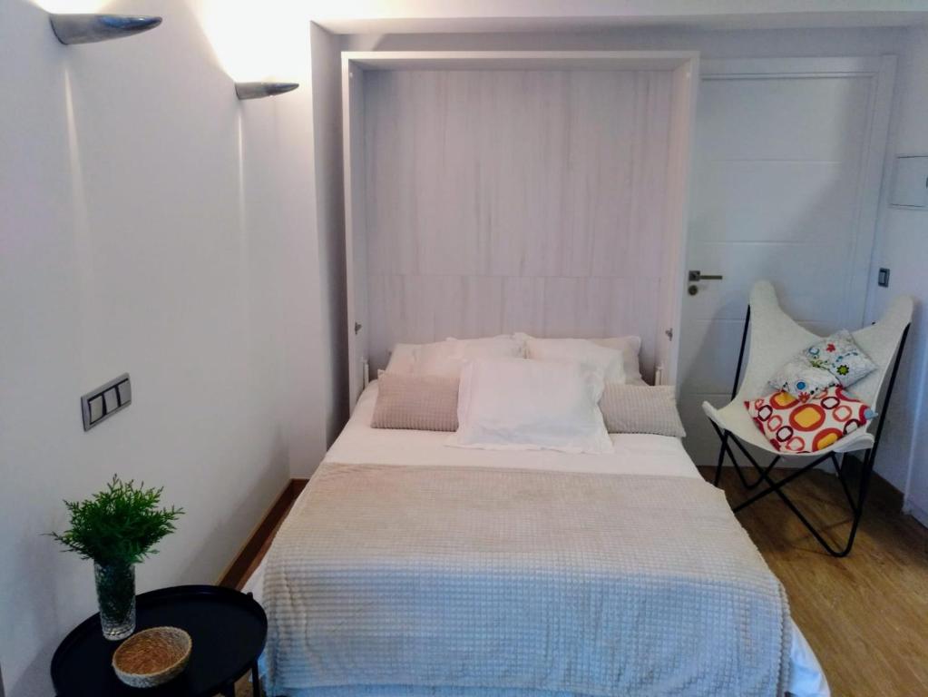 Posteľ alebo postele v izbe v ubytovaní Casa Rocha Velha con terraza y piscina particular