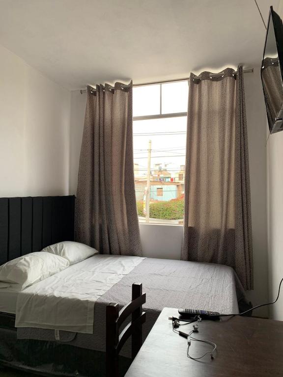 Ένα ή περισσότερα κρεβάτια σε δωμάτιο στο RESIDENCIAL SALAMANCA