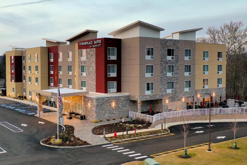a rendering of a hotel with a parking lot at TownePlace Suites by Marriott Clinton in Clinton