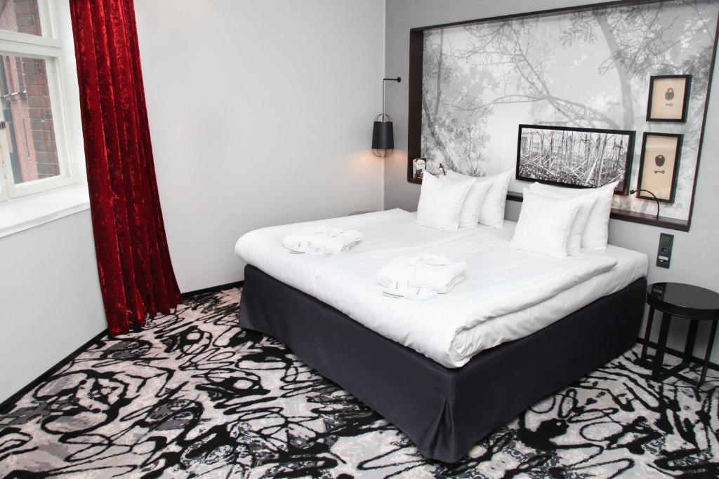 Postel nebo postele na pokoji v ubytování Home Hotel Katajanokka