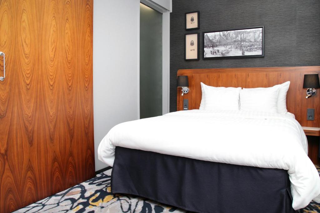 Postel nebo postele na pokoji v ubytování Home Hotel Katajanokka