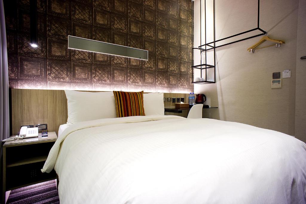 Postel nebo postele na pokoji v ubytování Via Hotel - Zhongxiao