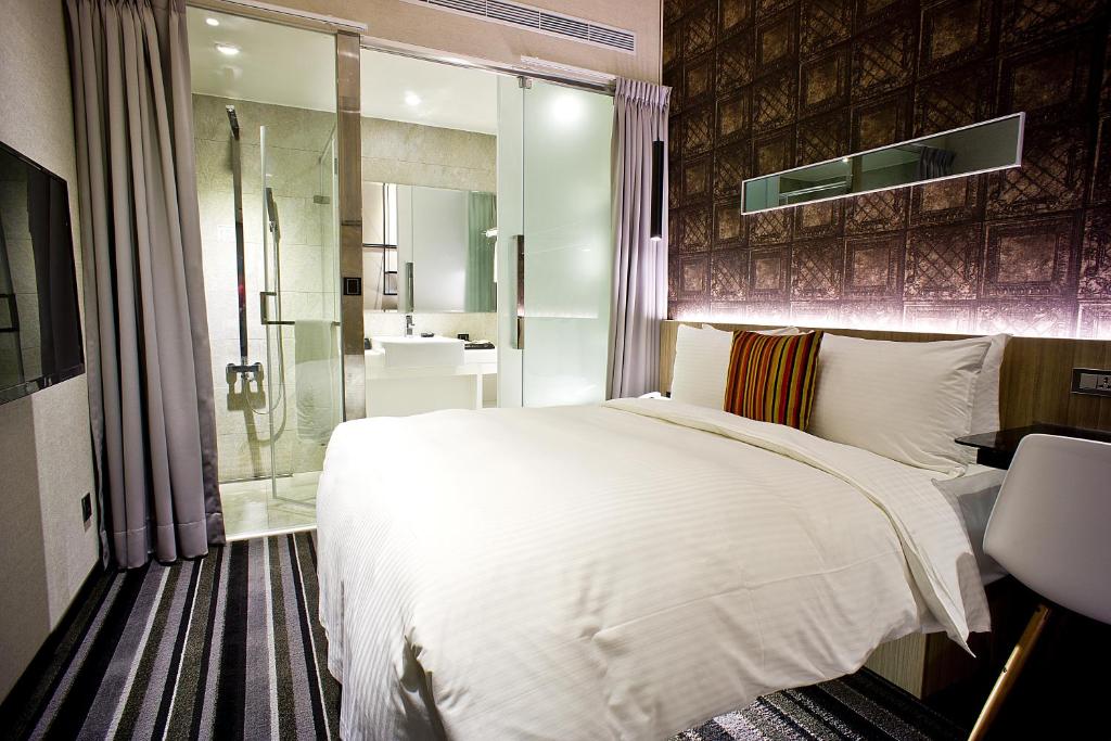 Postel nebo postele na pokoji v ubytování Via Hotel - Zhongxiao