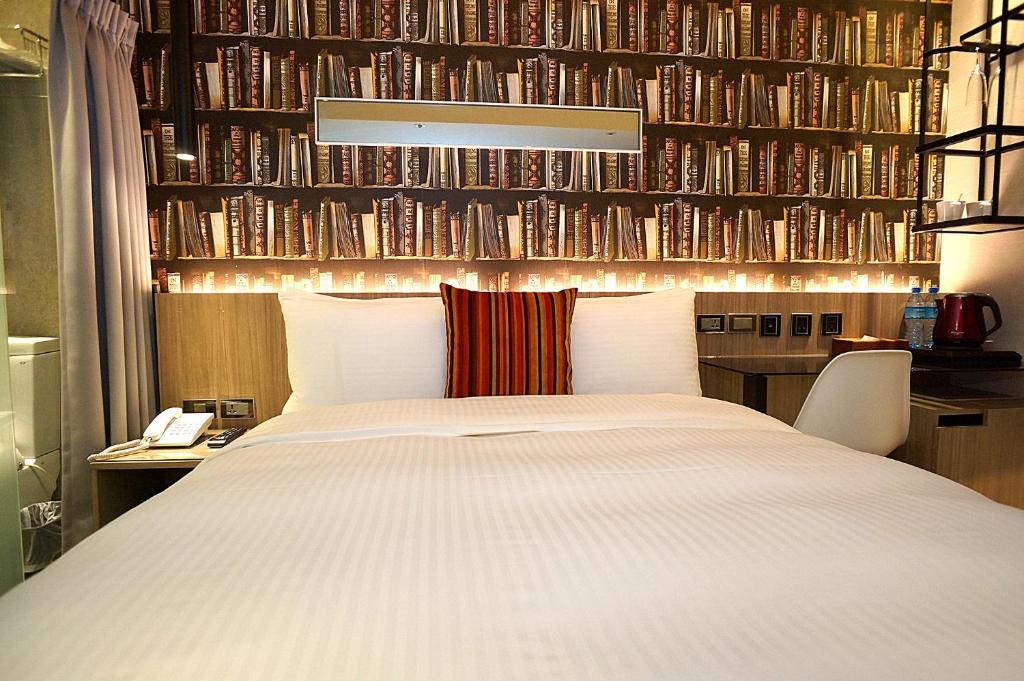 Postel nebo postele na pokoji v ubytování Via Hotel - Zhongxiao