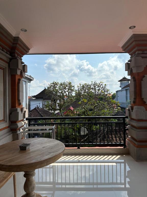 Balkón nebo terasa v ubytování Adipana Bungalow-Balinese Room