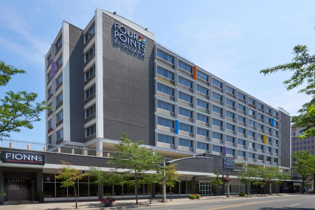 a rendering of the front of the hilton hotel at Four Points by Sheraton Windsor Downtown in Windsor