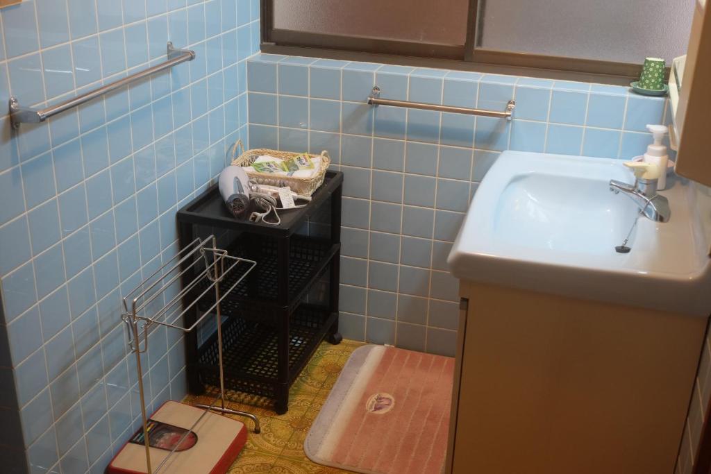 Koupelna v ubytování 農園民宿 春名 Farmstay Haruna