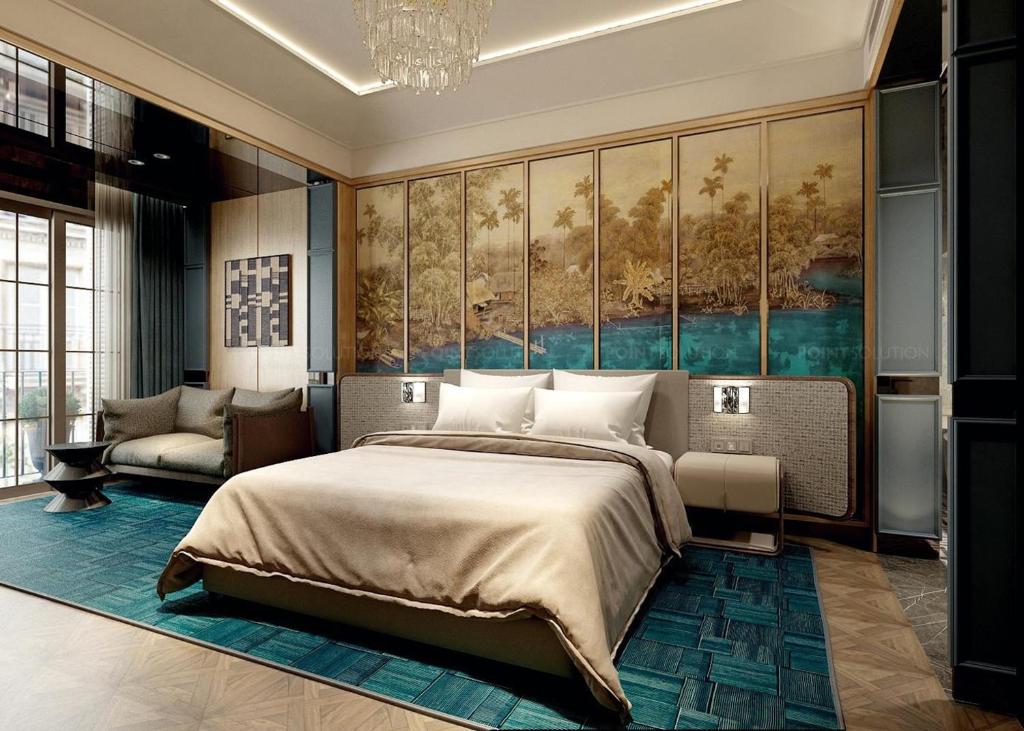 a bedroom with a large bed and a painting on the wall at La Passion Premium Cau Go in Hanoi