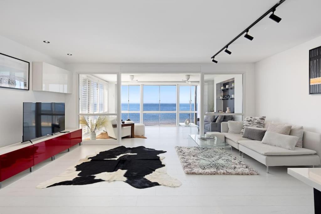 23 AMAZING Airbnb Penthouses for the Ultimate Getaway - Waterfront Penthouse With Tv Den Room