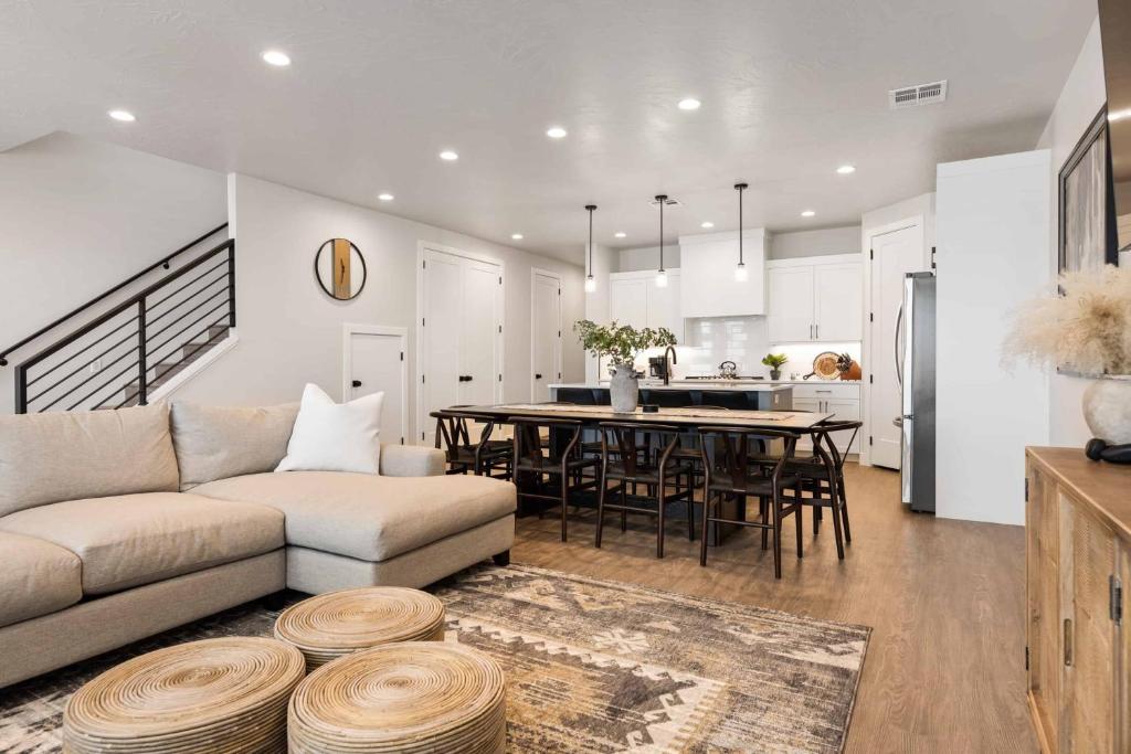 a living room with a couch and a table at Desert Daydream townhouse in St. George