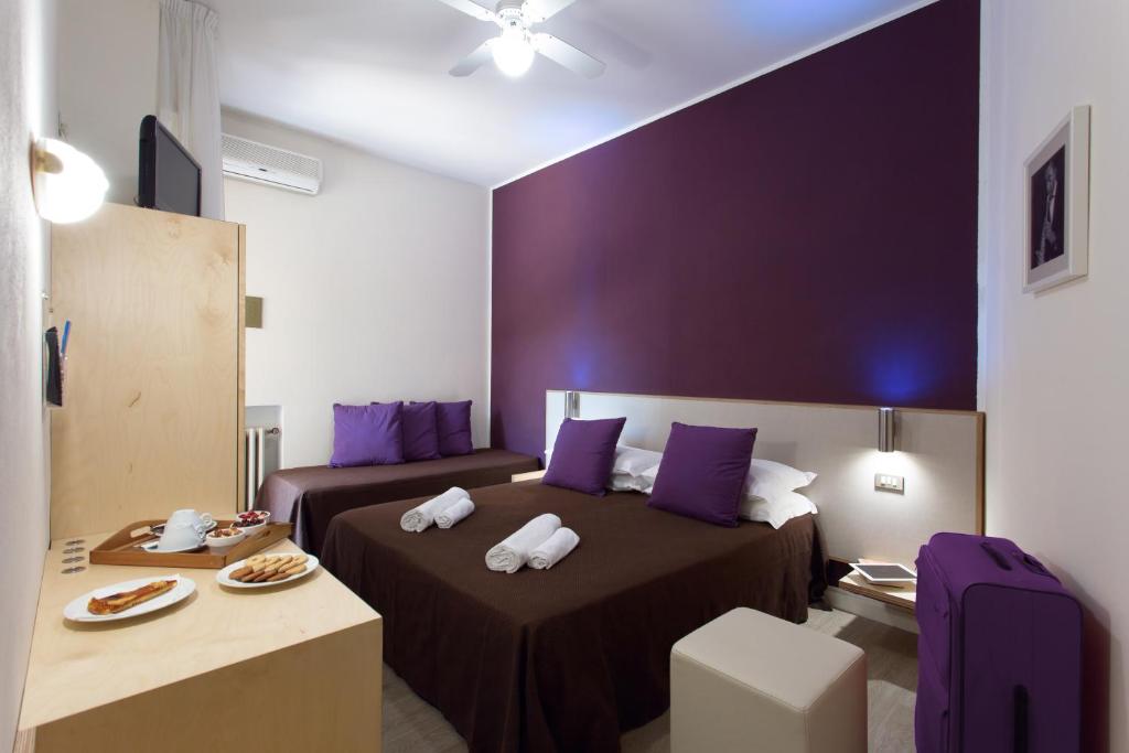 Postel nebo postele na pokoji v ubytování Hotel Antares
