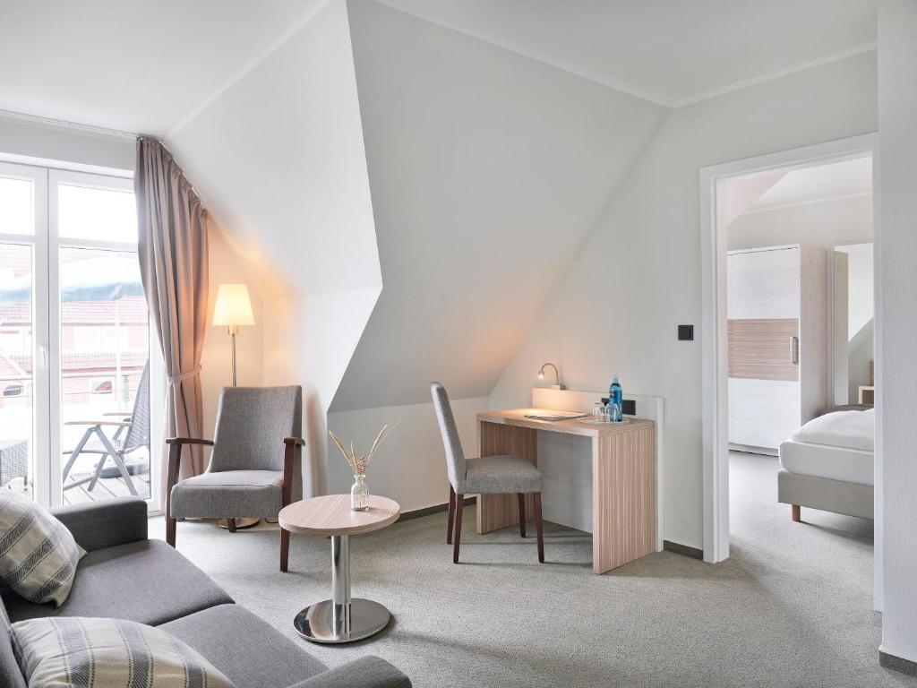 Postel nebo postele na pokoji v ubytování Hotel Strandhof