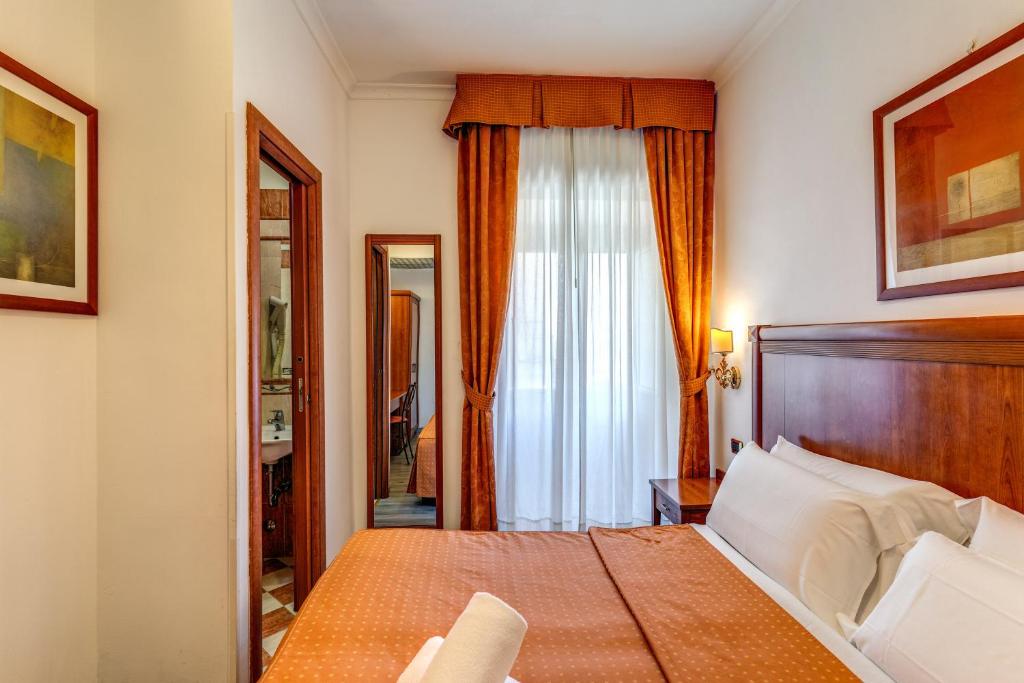Postel nebo postele na pokoji v ubytování Baltik Guesthouse