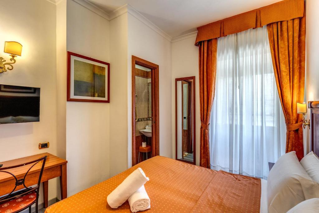 Postel nebo postele na pokoji v ubytování Baltik Guesthouse