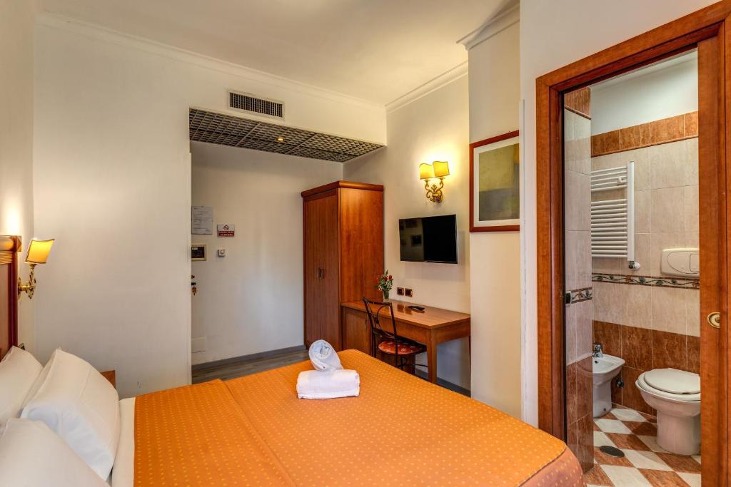 Postel nebo postele na pokoji v ubytování Baltik Guesthouse