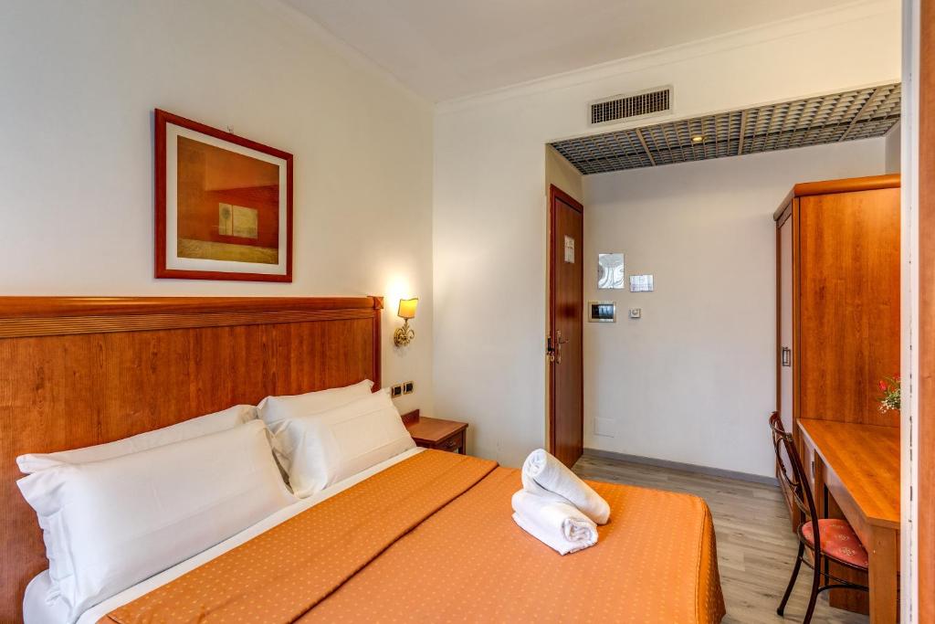 Postel nebo postele na pokoji v ubytování Baltik Guesthouse