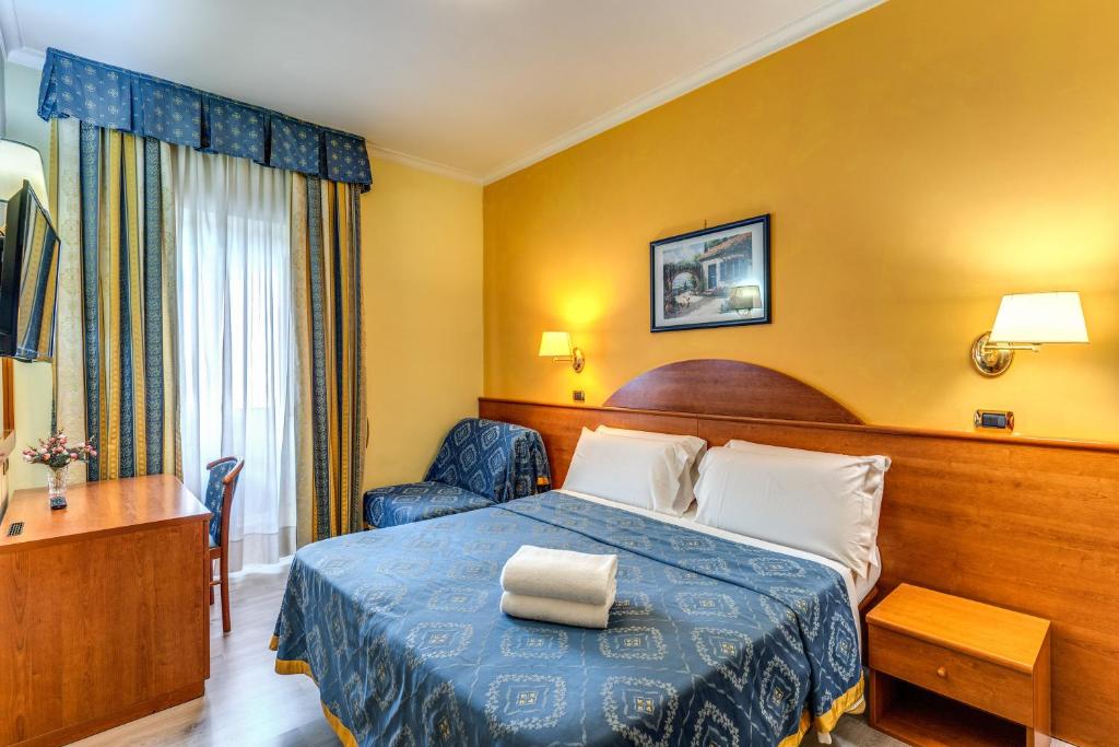 Postel nebo postele na pokoji v ubytování Baltik Guesthouse