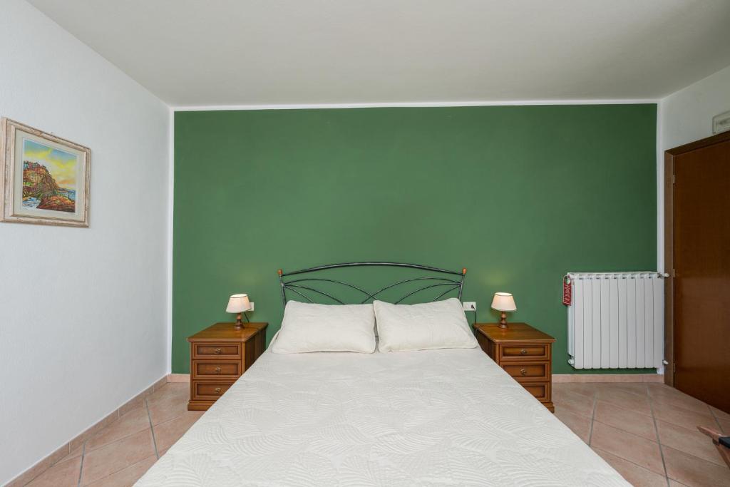 Postel nebo postele na pokoji v ubytování Agriturismo Daniela