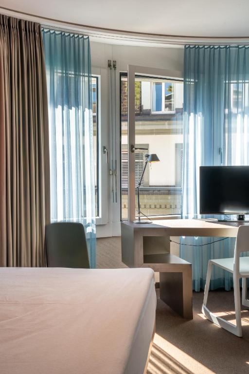 TV a/nebo společenská místnost v ubytování Hotel Continental Park