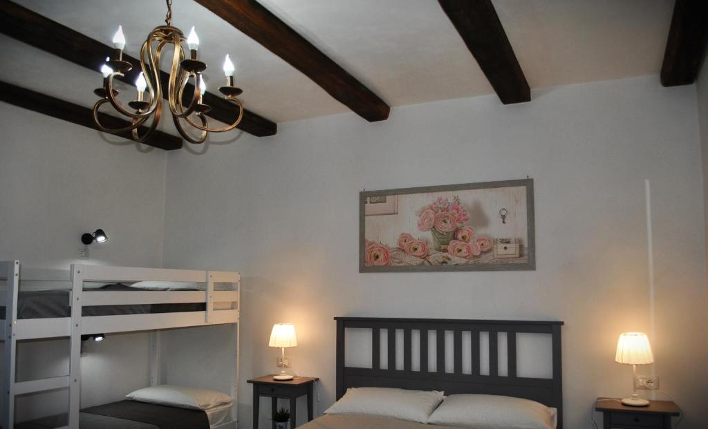 Postel nebo postele na pokoji v ubytování A casa dei nonni B&B