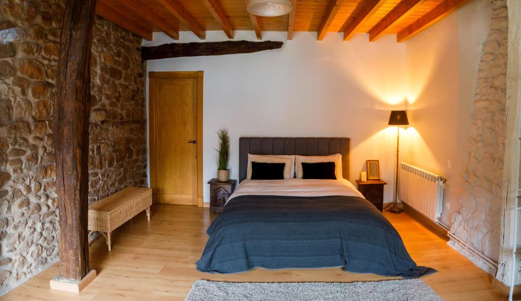 Postel nebo postele na pokoji v ubytování Casa el Envero