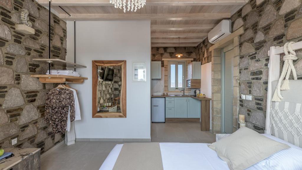 Kuchyň nebo kuchyňský kout v ubytování Hilltop Suites Milos