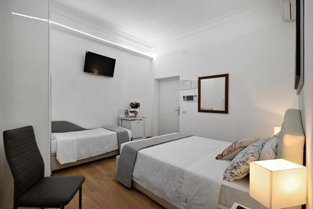 A bed or beds in a room at Il Fascino Di Roma