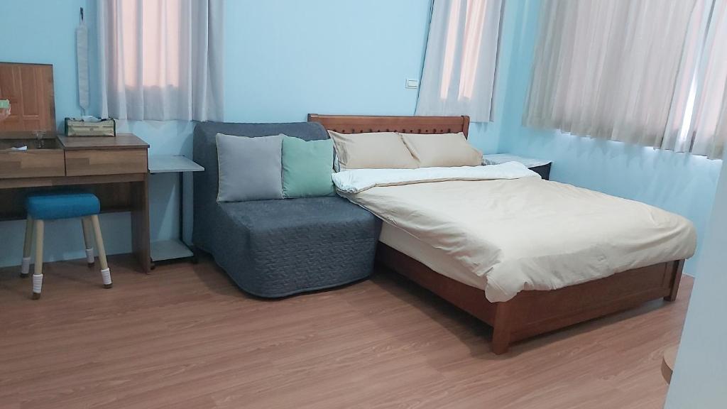Postel nebo postele na pokoji v ubytování Chin-Lan B&B
