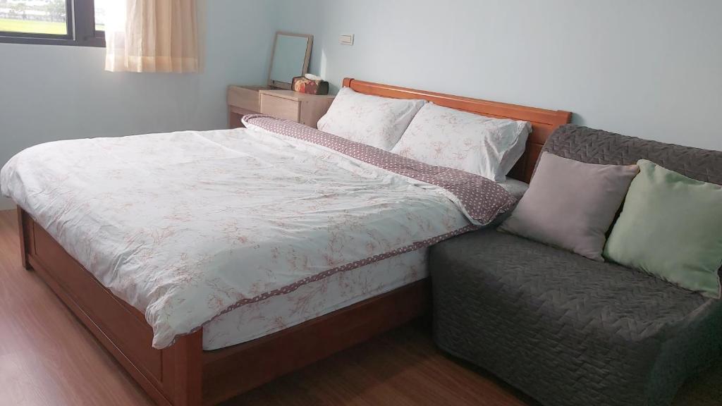 Postel nebo postele na pokoji v ubytování Chin-Lan B&B
