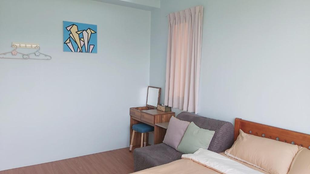 Postel nebo postele na pokoji v ubytování Chin-Lan B&B