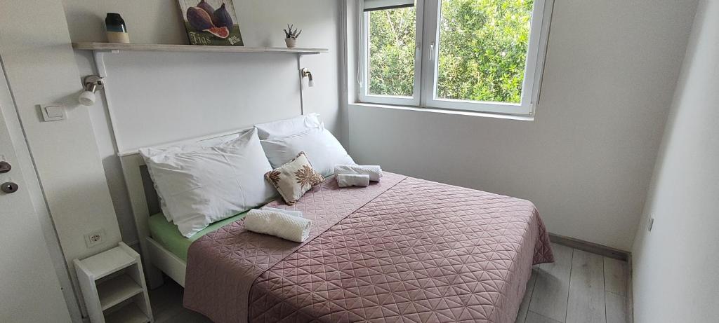 Letto o letti in una camera di Bicanic Apartments and Rooms