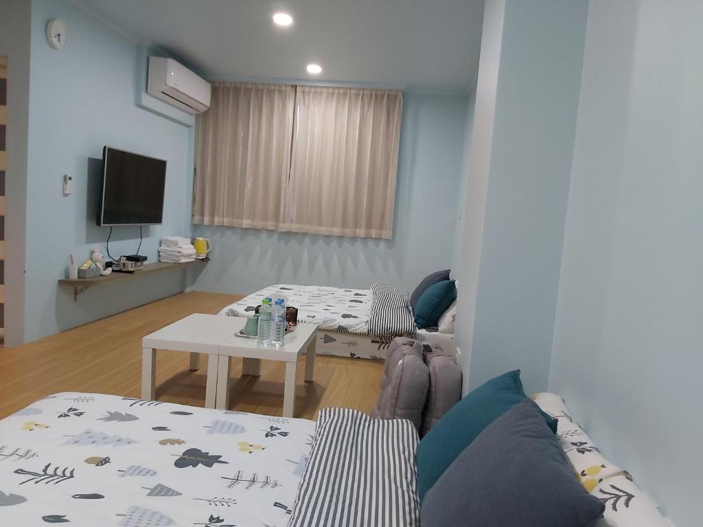 TV a/nebo společenská místnost v ubytování Chin-Lan B&B