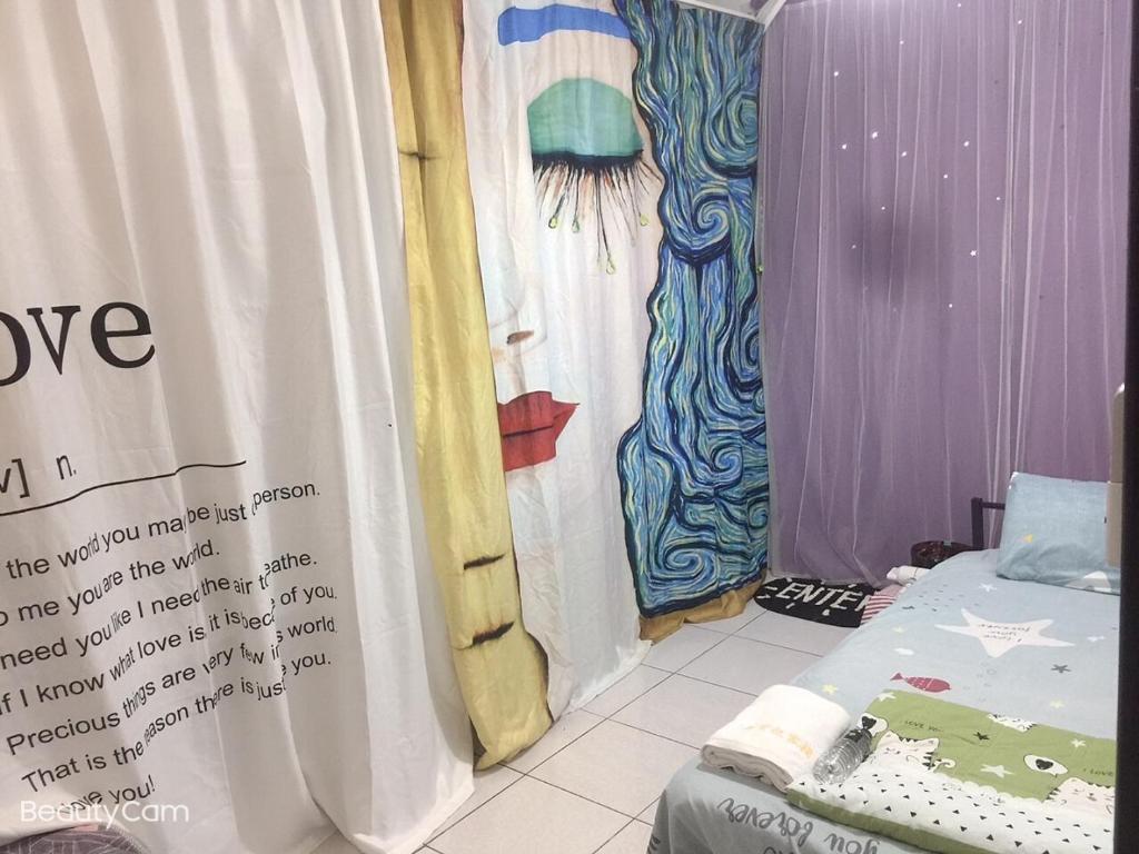 Postel nebo postele na pokoji v ubytování ㄧ個背包客棧