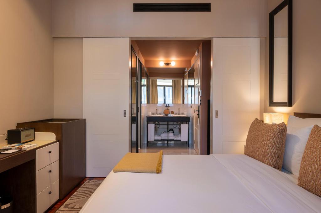 Postel nebo postele na pokoji v ubytování Casa da Marechal - Boutique Hotel by Oporto Collection - Adults Only