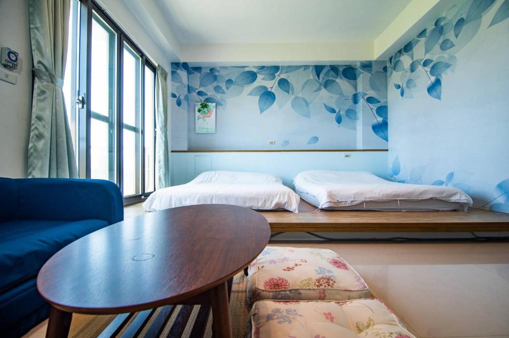 Postel nebo postele na pokoji v ubytování Wind Breathing B&B
