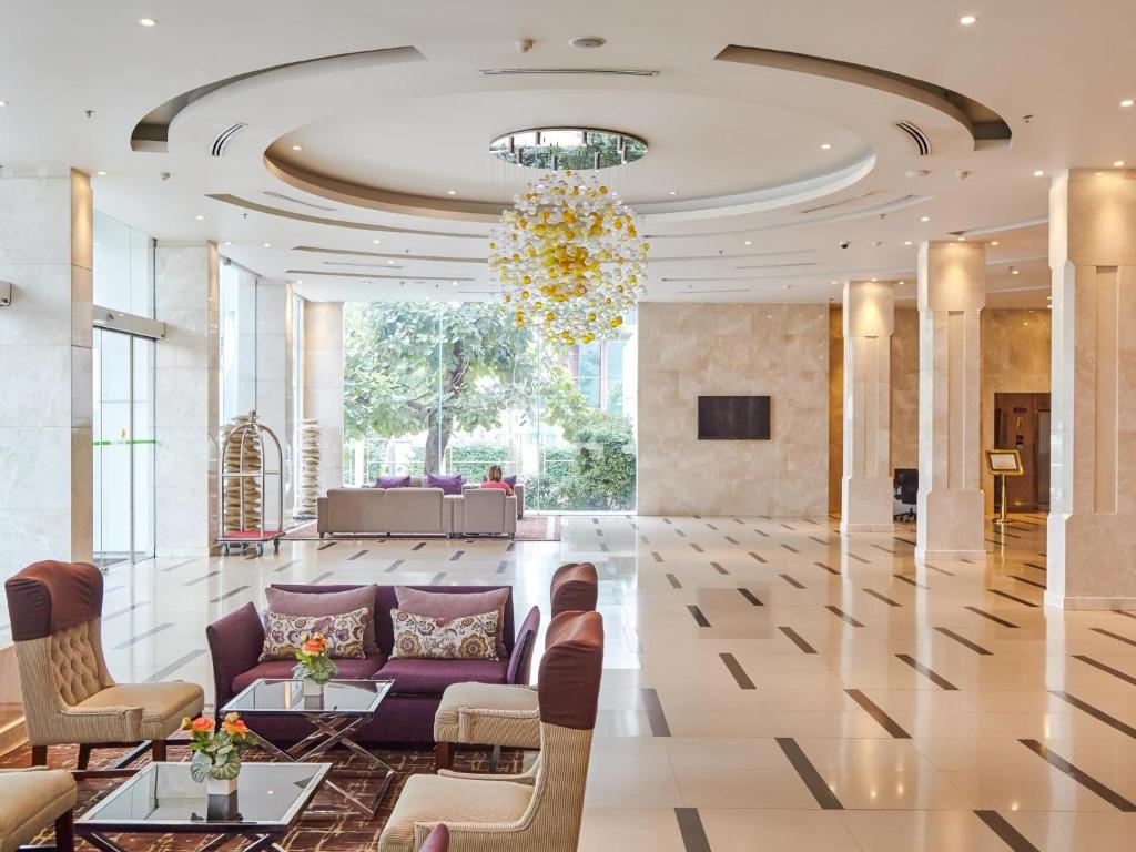 Posezení v ubytování Maple Hotel