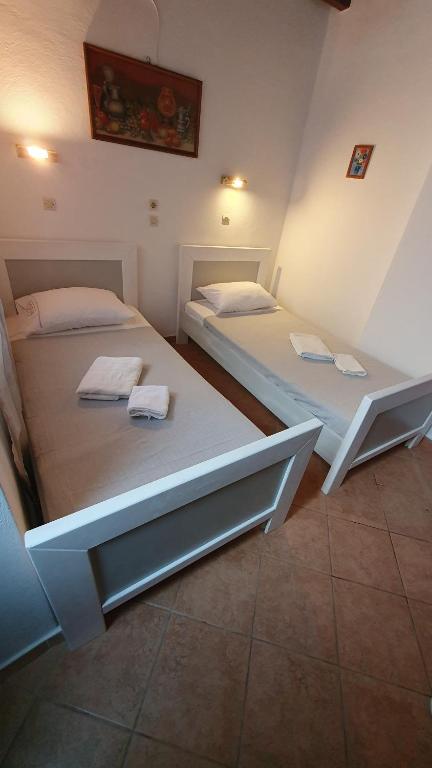 Postel nebo postele na pokoji v ubytování ASTORIA lindos