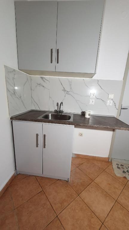 Kuchyň nebo kuchyňský kout v ubytování ASTORIA lindos