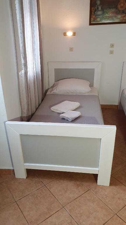 Postel nebo postele na pokoji v ubytování ASTORIA lindos
