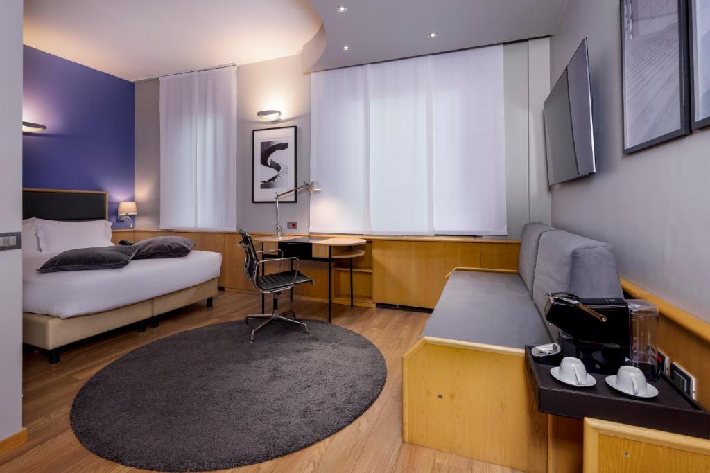 Posteľ alebo postele v izbe v ubytovaní Best Western Plus Executive Hotel and Suites